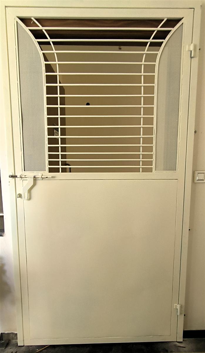 A high-security MS safety door with multiple locking points and a dark finish.